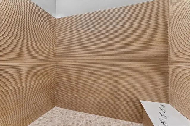 a view of a swimming pool with an outdoor space and seating area