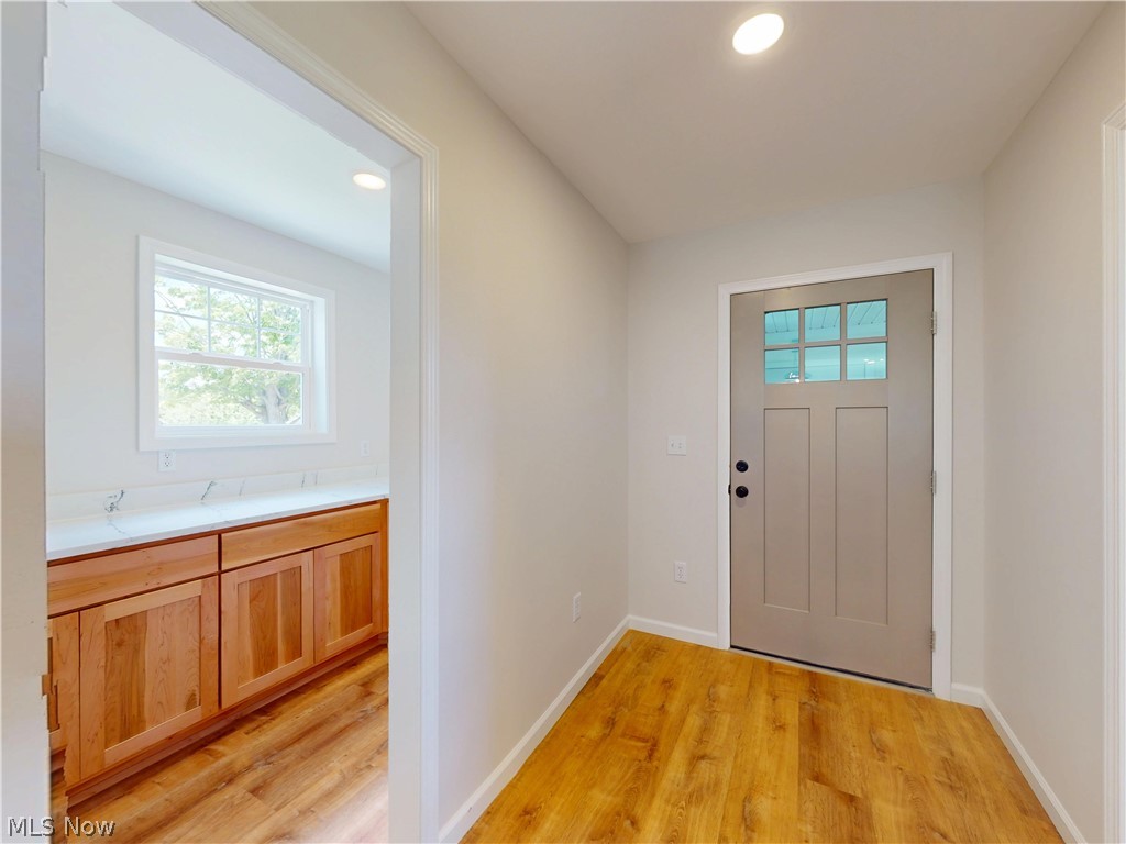 12395 Winchell Road Painesville, OH 44077 - Photo 5 of 46 Entry from mud room with pantry and bathroom