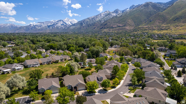 1417 Blacksmith Lane Draper, UT 84020 - Photo 53 of 57 Aerial perspective of a residential community featuring mature trees and a curving street layout