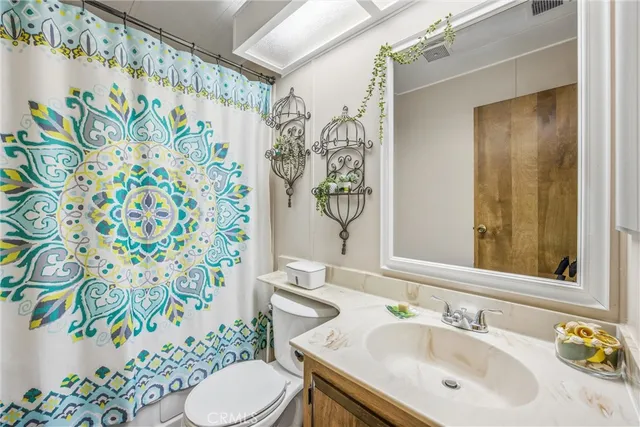 a bathroom with a sink and a toilet