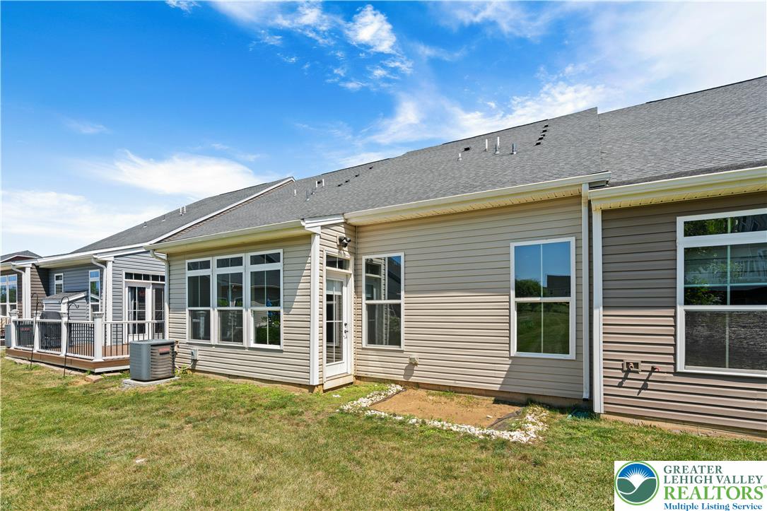 4758 Rafi Road Easton, PA 18045 - Photo 51 of 55 A well-maintained rear facade features ample windows and a private outdoor space.