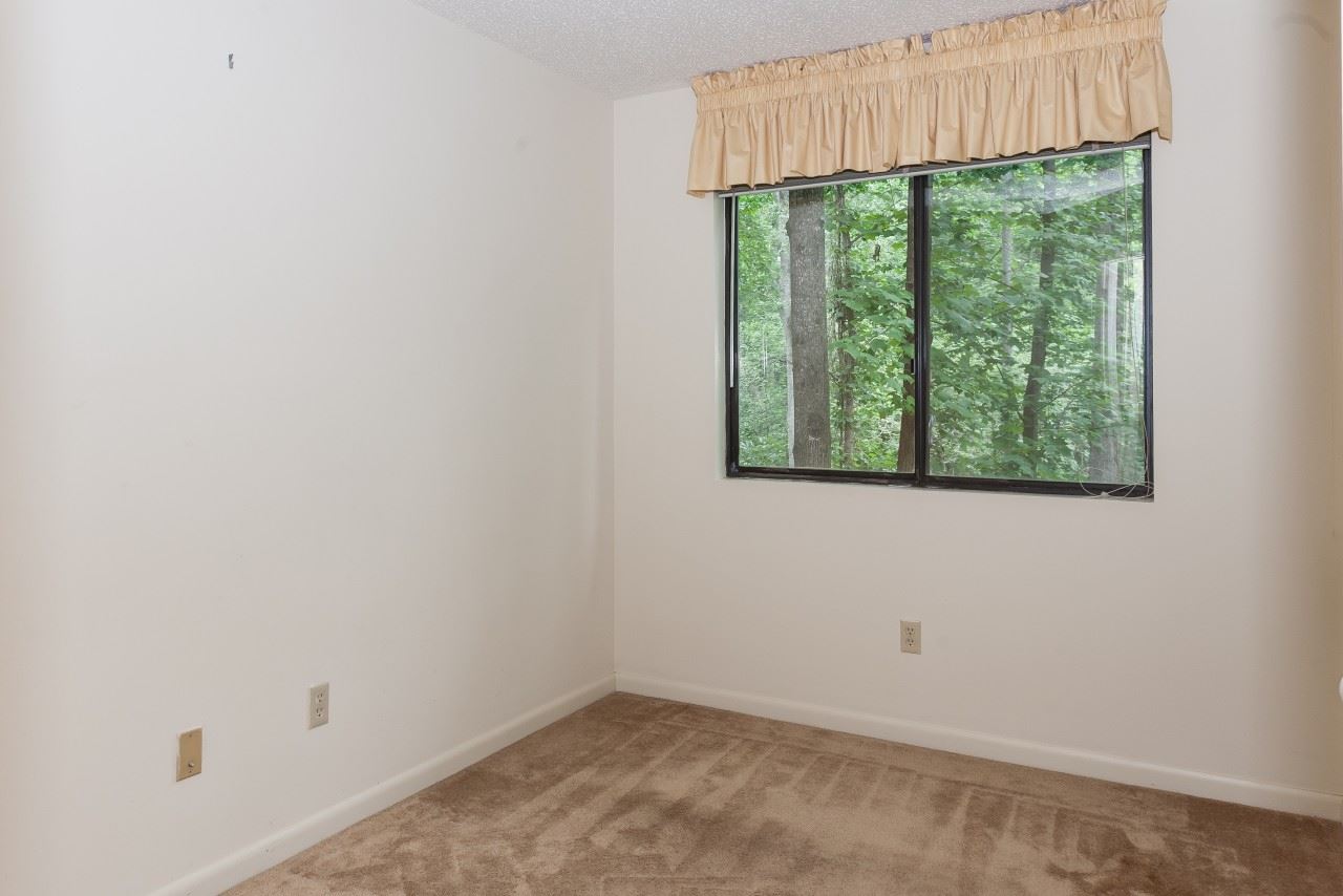 113 Turtle Creek Road, Unit 7 Charlottesville, VA 22901 - Photo 11 of 32 an empty room with a window
