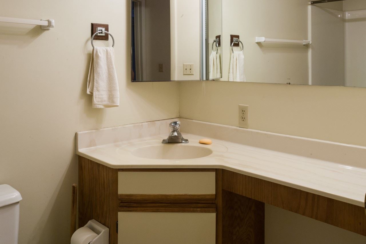 113 Turtle Creek Road, Unit 7 Charlottesville, VA 22901 - Photo 18 of 32 a bathroom with a sink and a mirror