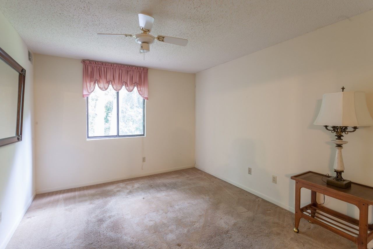 113 Turtle Creek Road, Unit 7 Charlottesville, VA 22901 - Photo 2 of 32 wooden floor in an empty room with a window