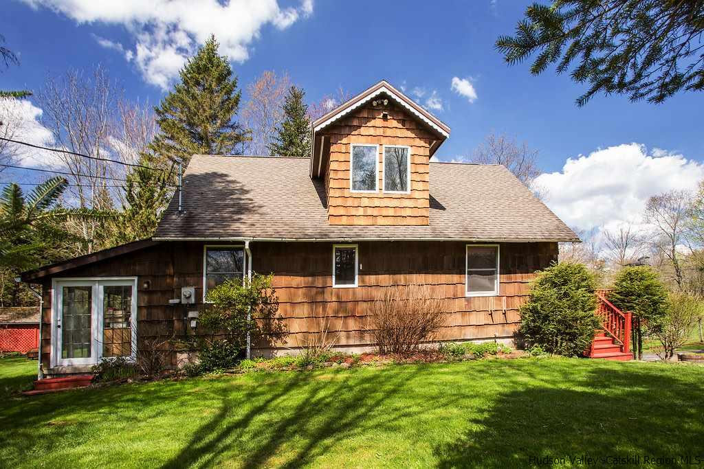 705 Henry Williams Road Roxbury, NY 12474 - Photo 3 of 34 a front view of a house with a yard