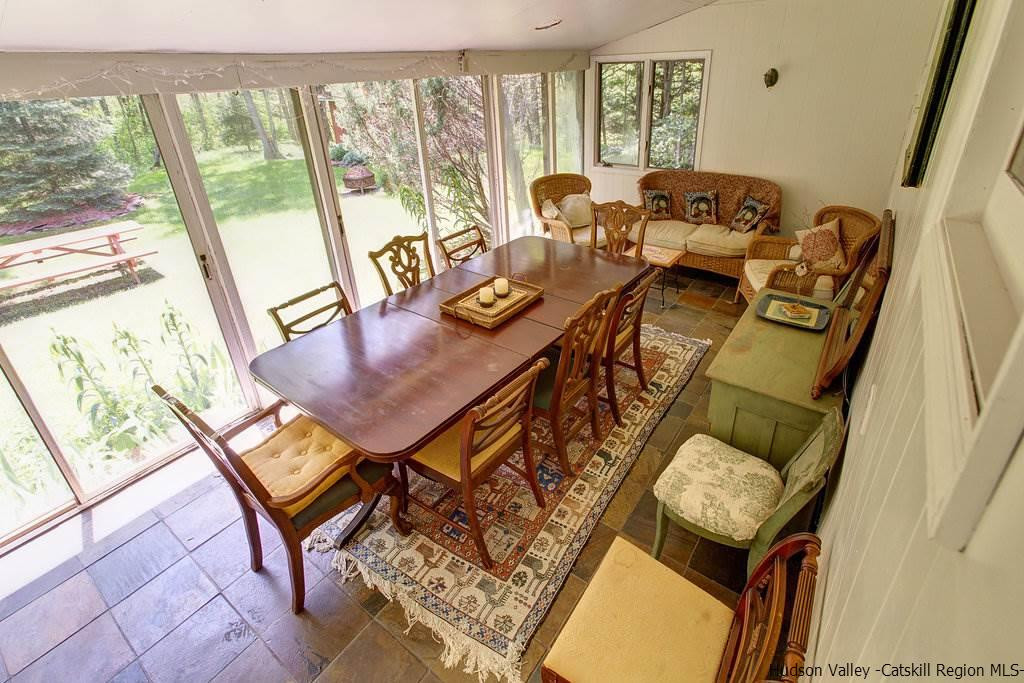 705 Henry Williams Road Roxbury, NY 12474 - Photo 9 of 34 a living room with furniture and a window