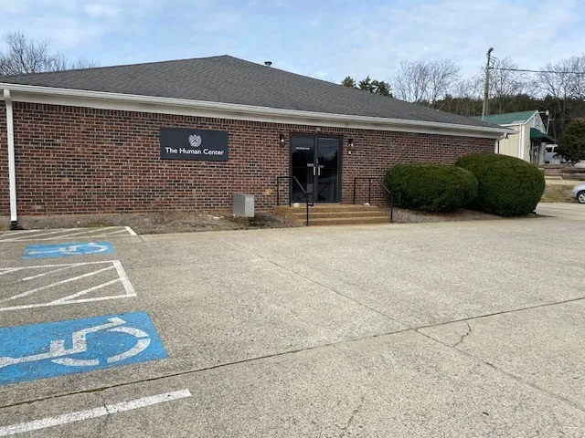 front view of a house with a patio