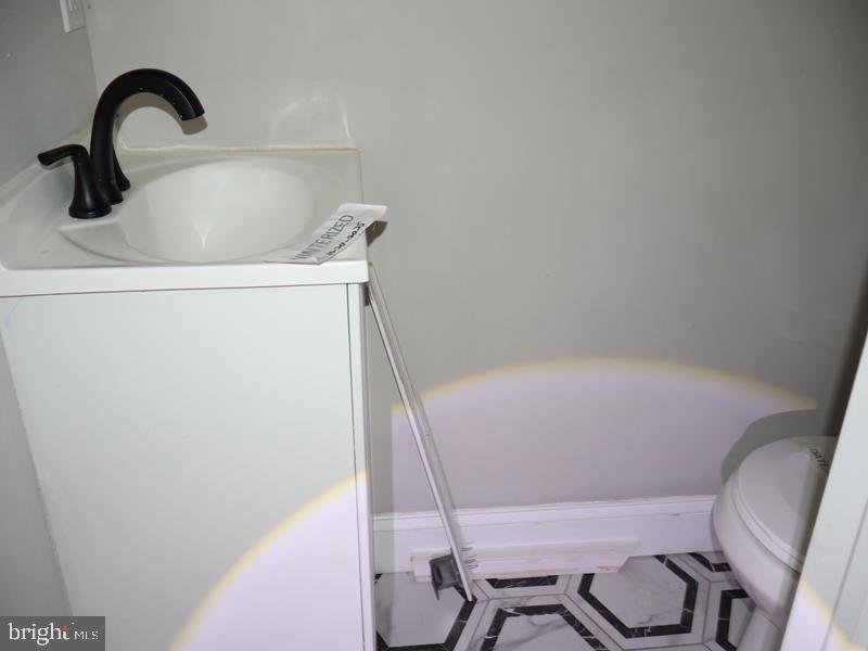 2212 Morris Street Philadelphia, PA 19145 - Photo 6 of 14 a bathroom with a sink