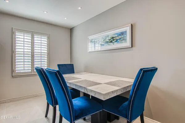 a view of a dining room with furniture