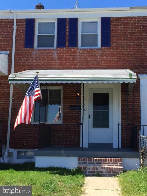 362 Grovethorn Road Baltimore, MD 21220 - Photo 1 of 14 a view of house with yard