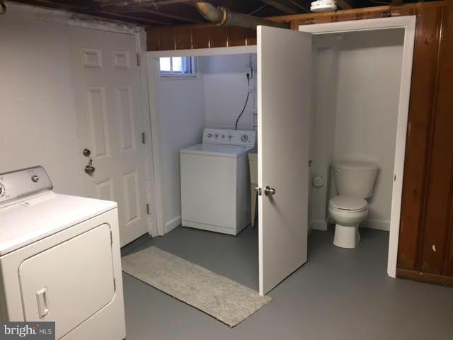 362 Grovethorn Road Baltimore, MD 21220 - Photo 10 of 14 a view of bathroom with a toilet sink and mirror