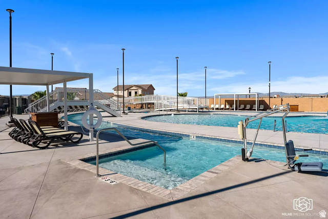 1166 North Riviera Alley Washington, UT 84780 - Photo 23 of 26 Community pool featuring a patio area