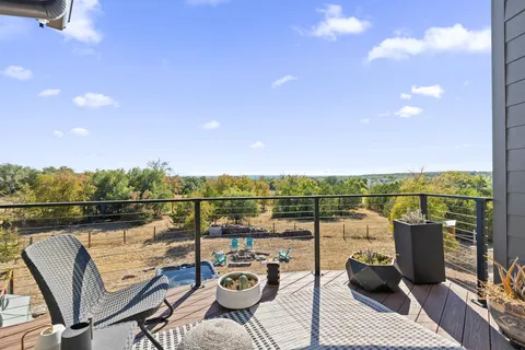a view of a terrace with furniture
