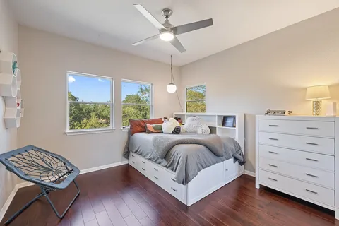 a bed room with a bed and a window