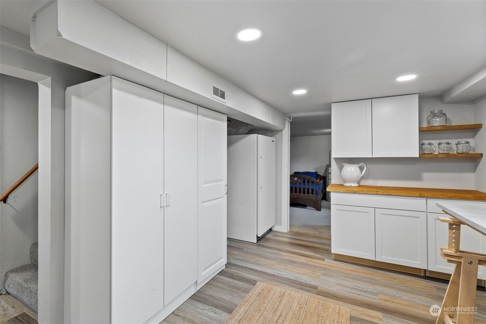 1601 Virginia Avenue Everett, WA 98201 - Photo 15 of 30 a large white kitchen with a sink and dishwasher a refrigerator with wooden floor