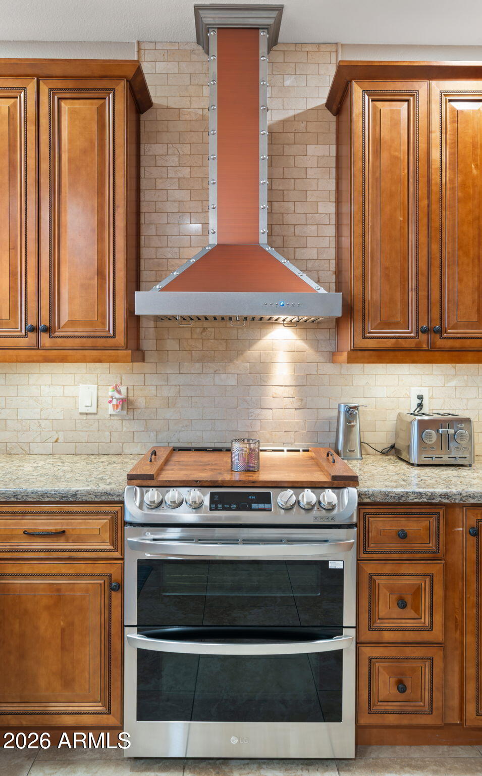 1957 South Talbot Circle Mesa, AZ 85209 - Photo 25 of 35 a stove top oven sitting inside of a kitchen