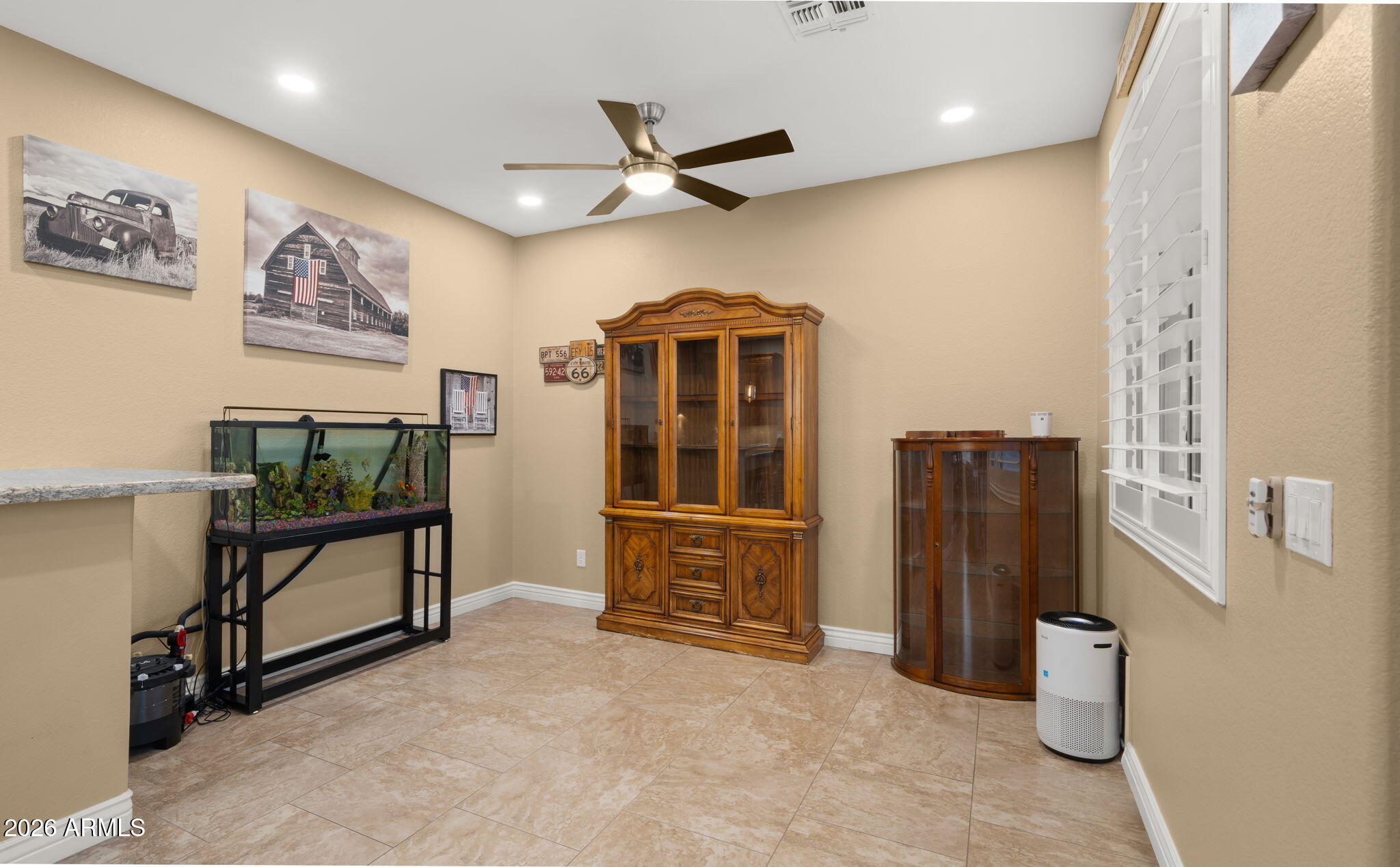 1957 South Talbot Circle Mesa, AZ 85209 - Photo 28 of 35 a view of a livingroom with furniture and a ceiling fan