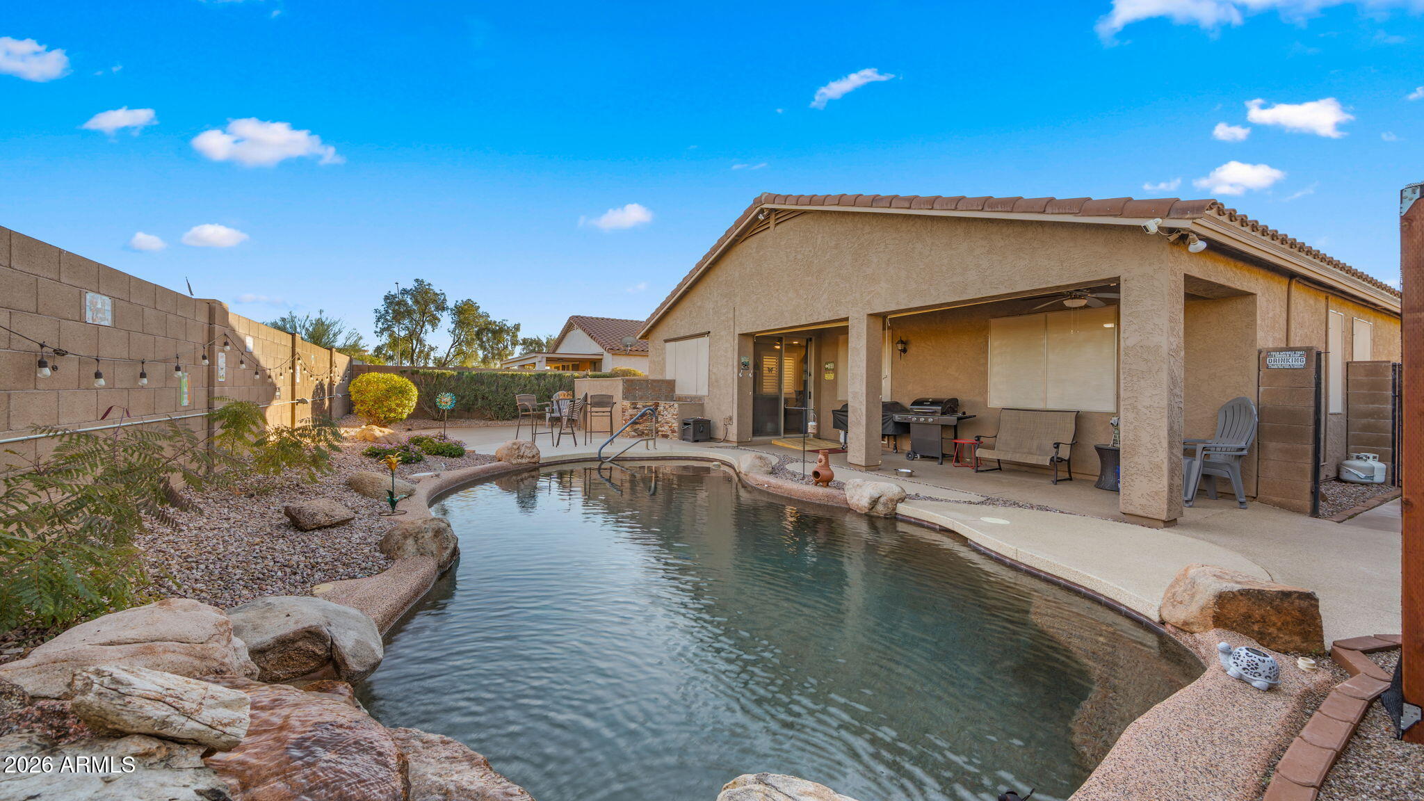 1957 South Talbot Circle Mesa, AZ 85209 - Photo 2 of 35 a view of a house with swimming pool and sitting area
