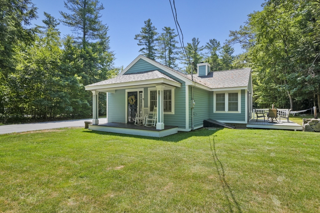 153 Sherbert Road Ashburnham, MA 01430 - Photo 1 of 32 a view of a house with a backyard