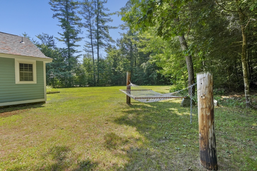 153 Sherbert Road Ashburnham, MA 01430 - Photo 25 of 32 a view of a house with a backyard