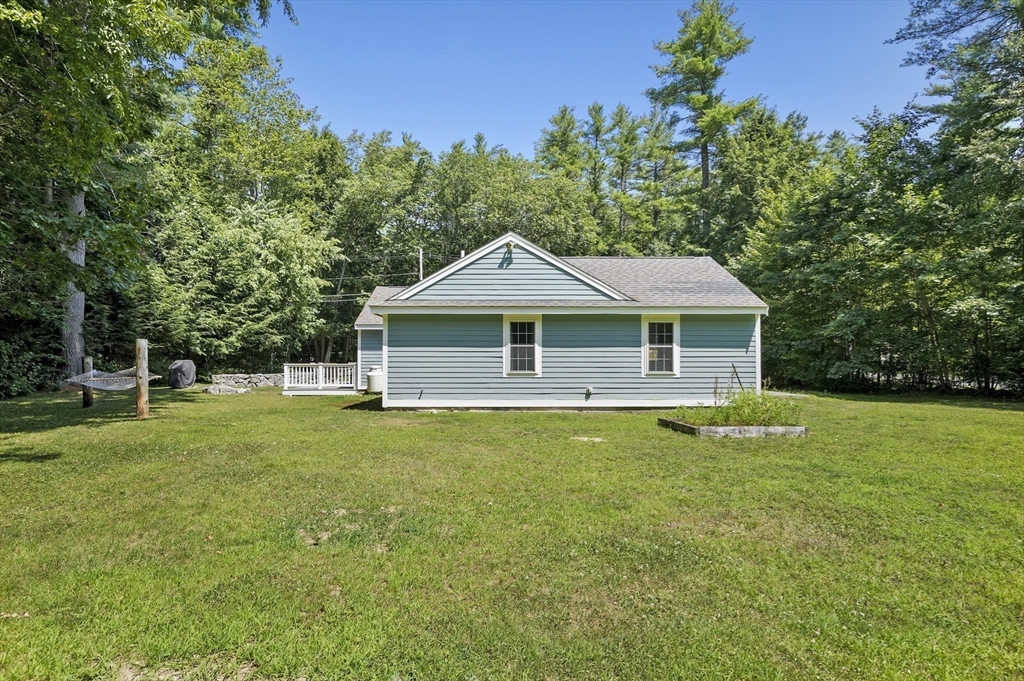 153 Sherbert Road Ashburnham, MA 01430 - Photo 26 of 32 a front view of a house with a garden