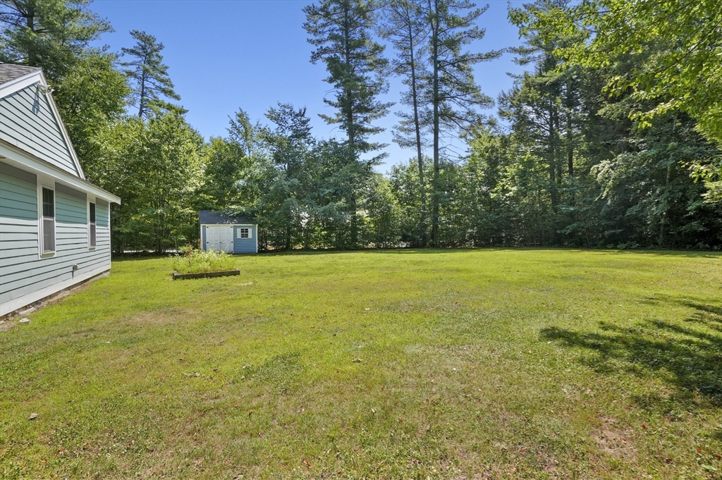 153 Sherbert Road Ashburnham, MA 01430 - Photo 27 of 32 a view of a house with a yard
