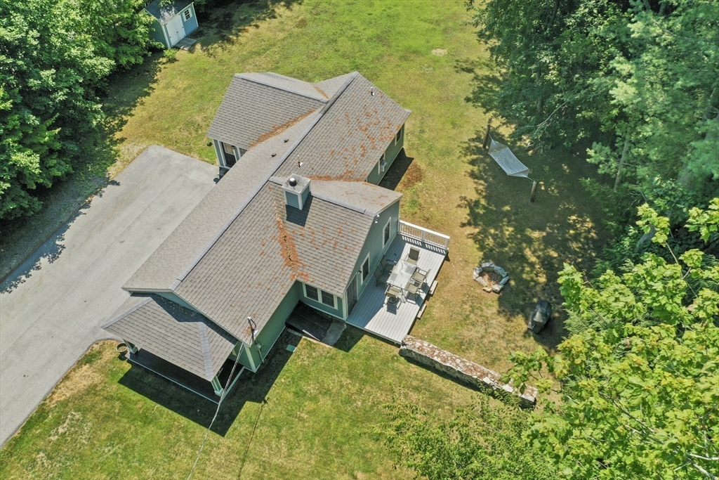 153 Sherbert Road Ashburnham, MA 01430 - Photo 28 of 32 an aerial view of a backyard with swimming pool and outdoor seating