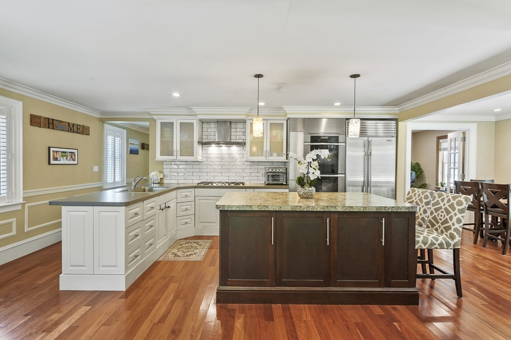 153 Sherbert Road Ashburnham, MA 01430 - Photo 7 of 32 a kitchen with stainless steel appliances granite countertop a stove and cabinets