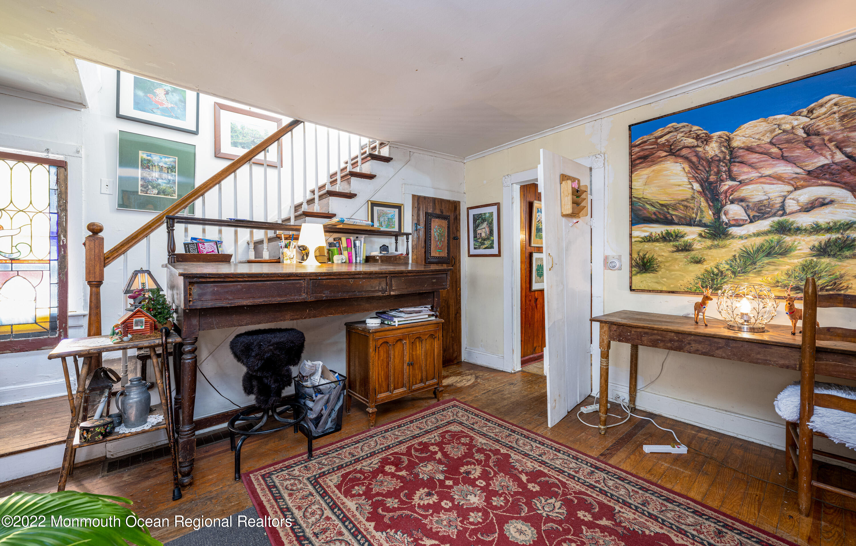295 Newtons Corner Road Howell, NJ 07731 - Photo 20 of 42 a living room with furniture and a rug