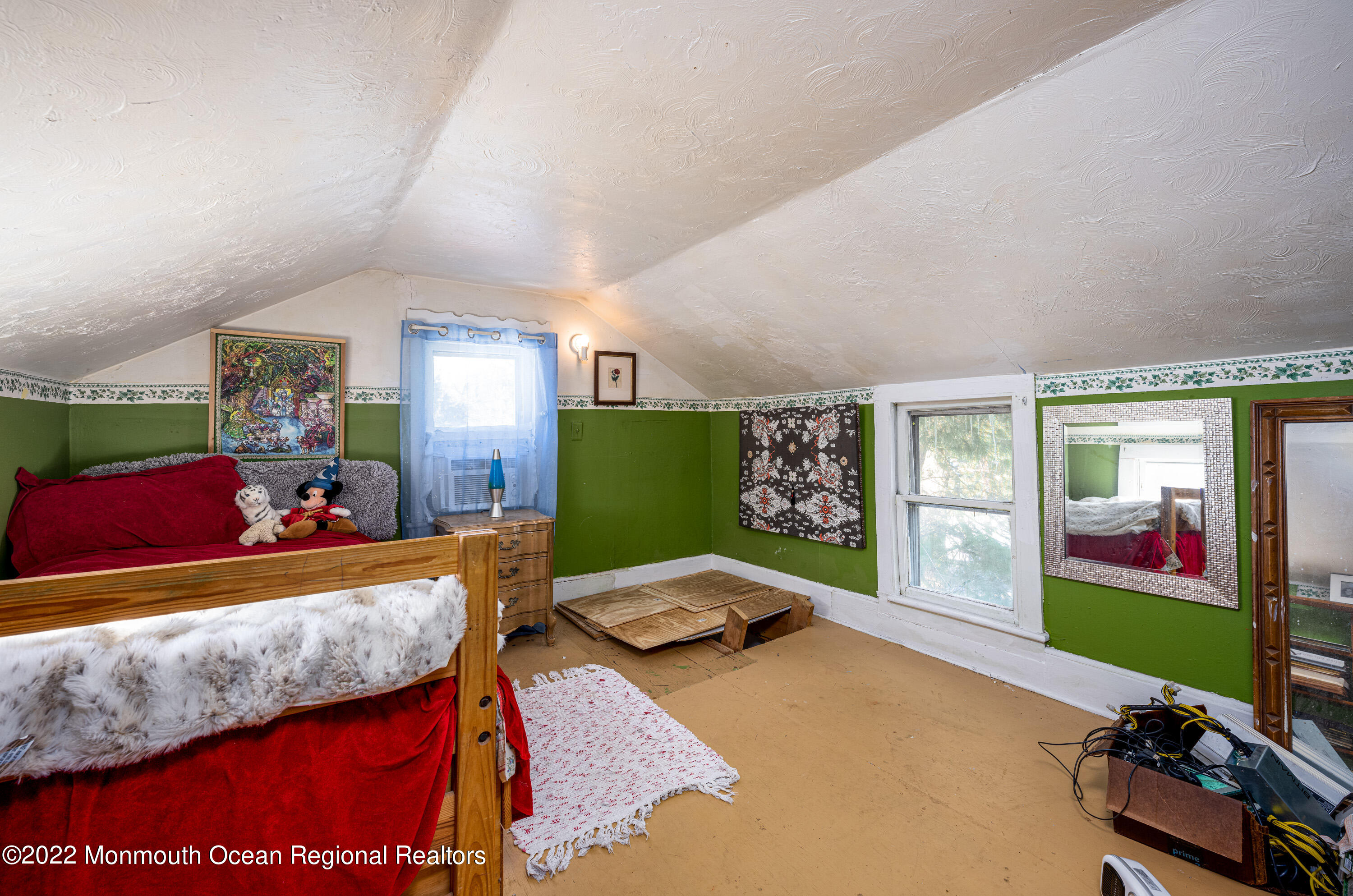 295 Newtons Corner Road Howell, NJ 07731 - Photo 22 of 42 a bedroom with furniture and a flat screen tv