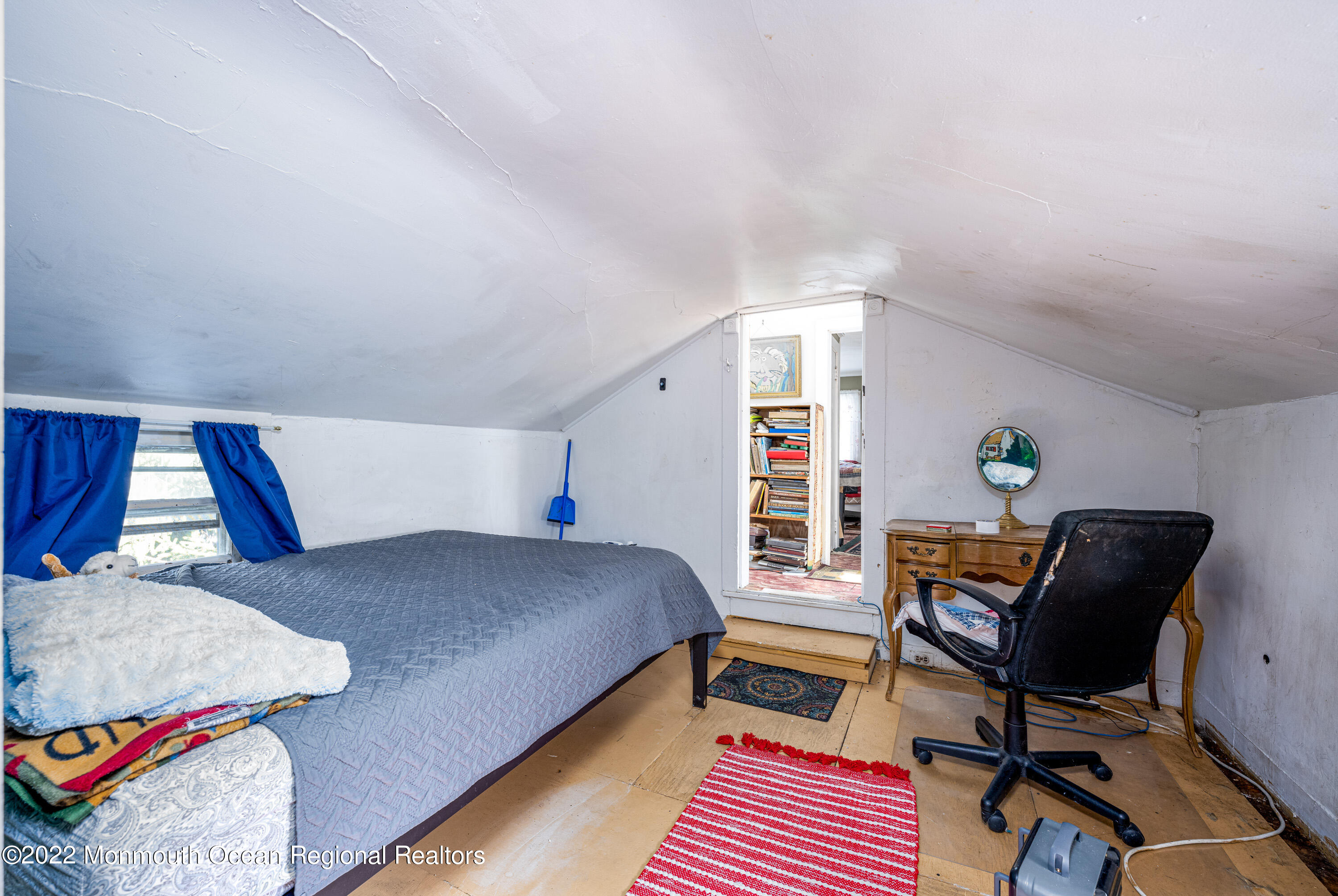 295 Newtons Corner Road Howell, NJ 07731 - Photo 24 of 42 a bedroom with a bed and wooden floor