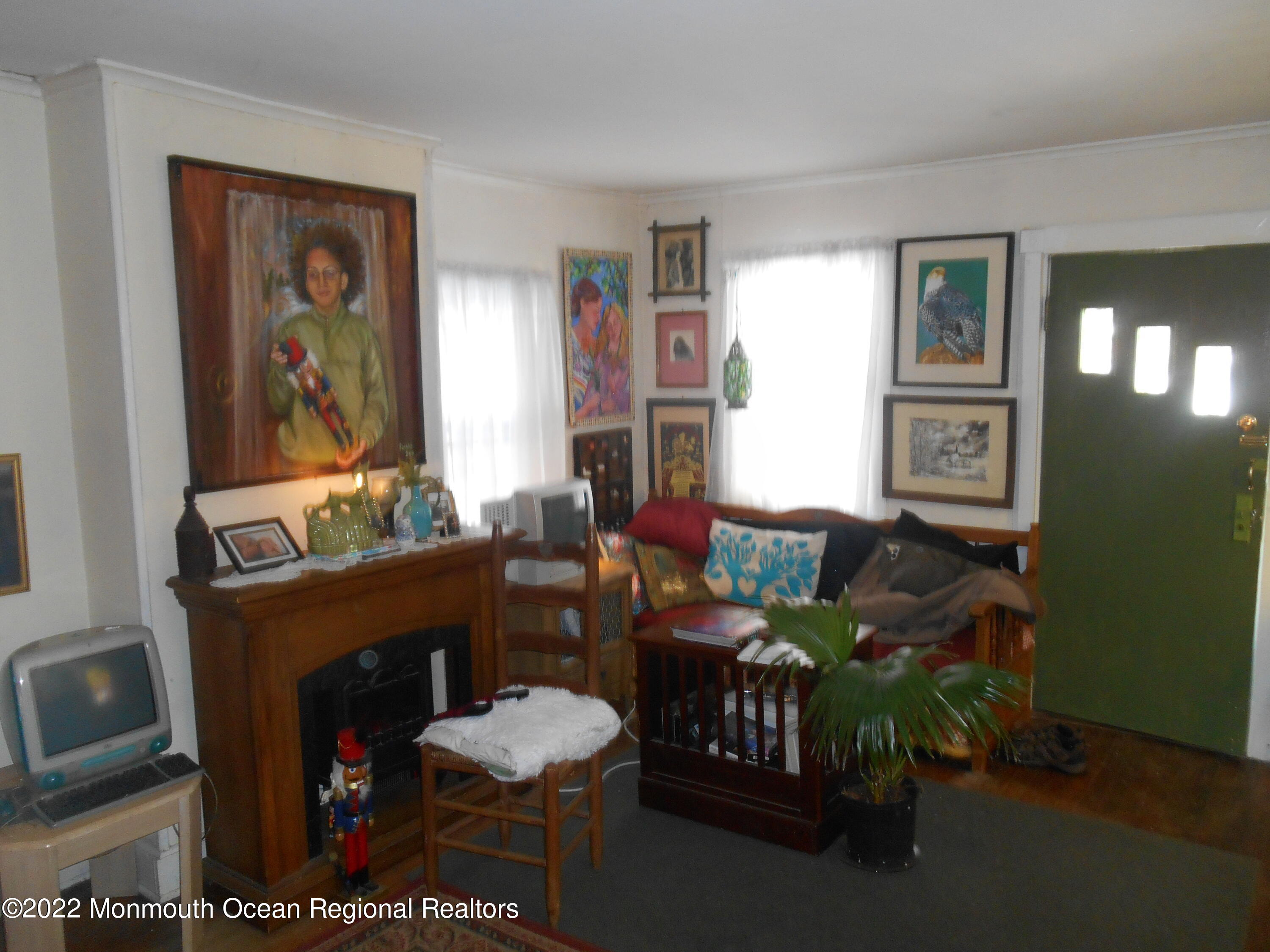 295 Newtons Corner Road Howell, NJ 07731 - Photo 34 of 42 a living room with furniture a window and couch