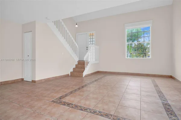 a view of an entryway with stairs