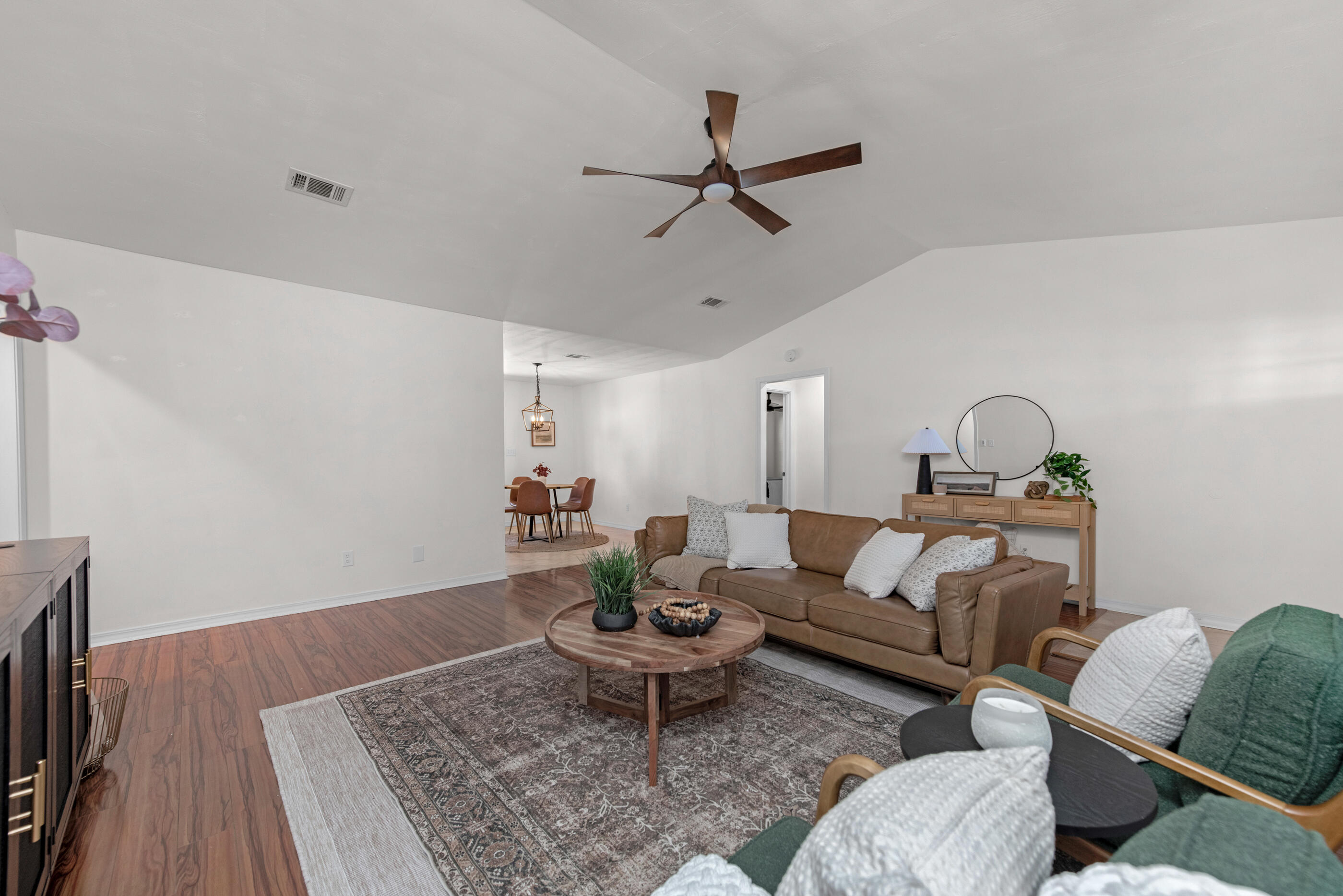 2709 Augustus Road Navarre, FL 32566 - Photo 11 of 46 a living room with furniture and a rug