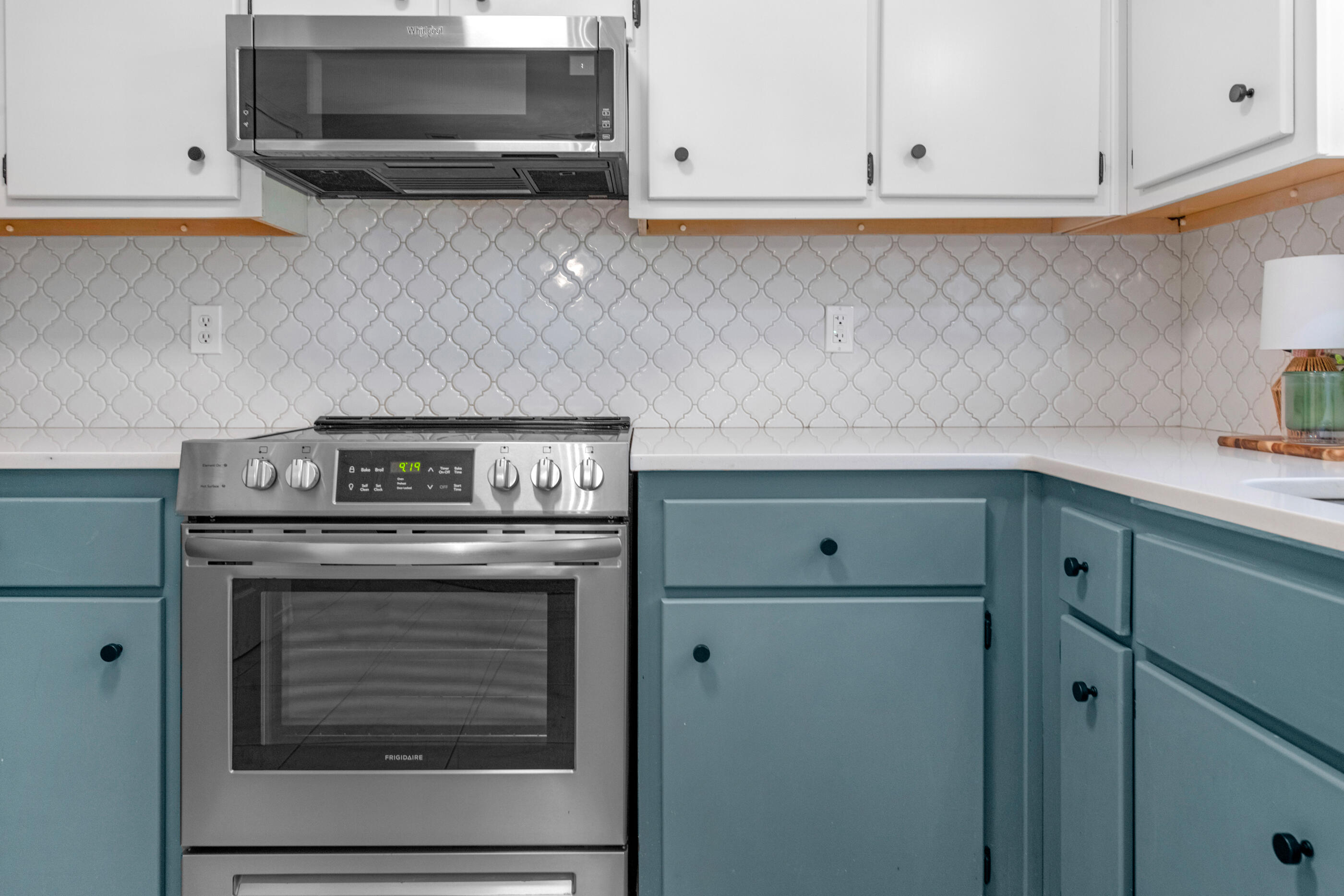2709 Augustus Road Navarre, FL 32566 - Photo 20 of 46 a stove top oven sitting inside of a kitchen