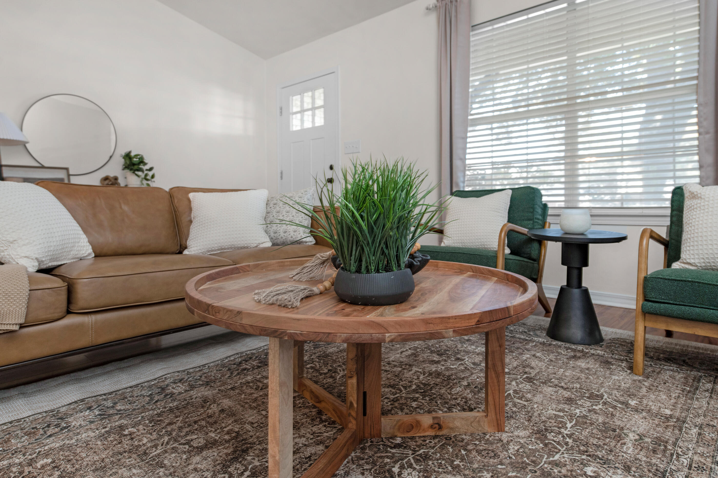 2709 Augustus Road Navarre, FL 32566 - Photo 22 of 46 a living room with furniture flowerpot and window
