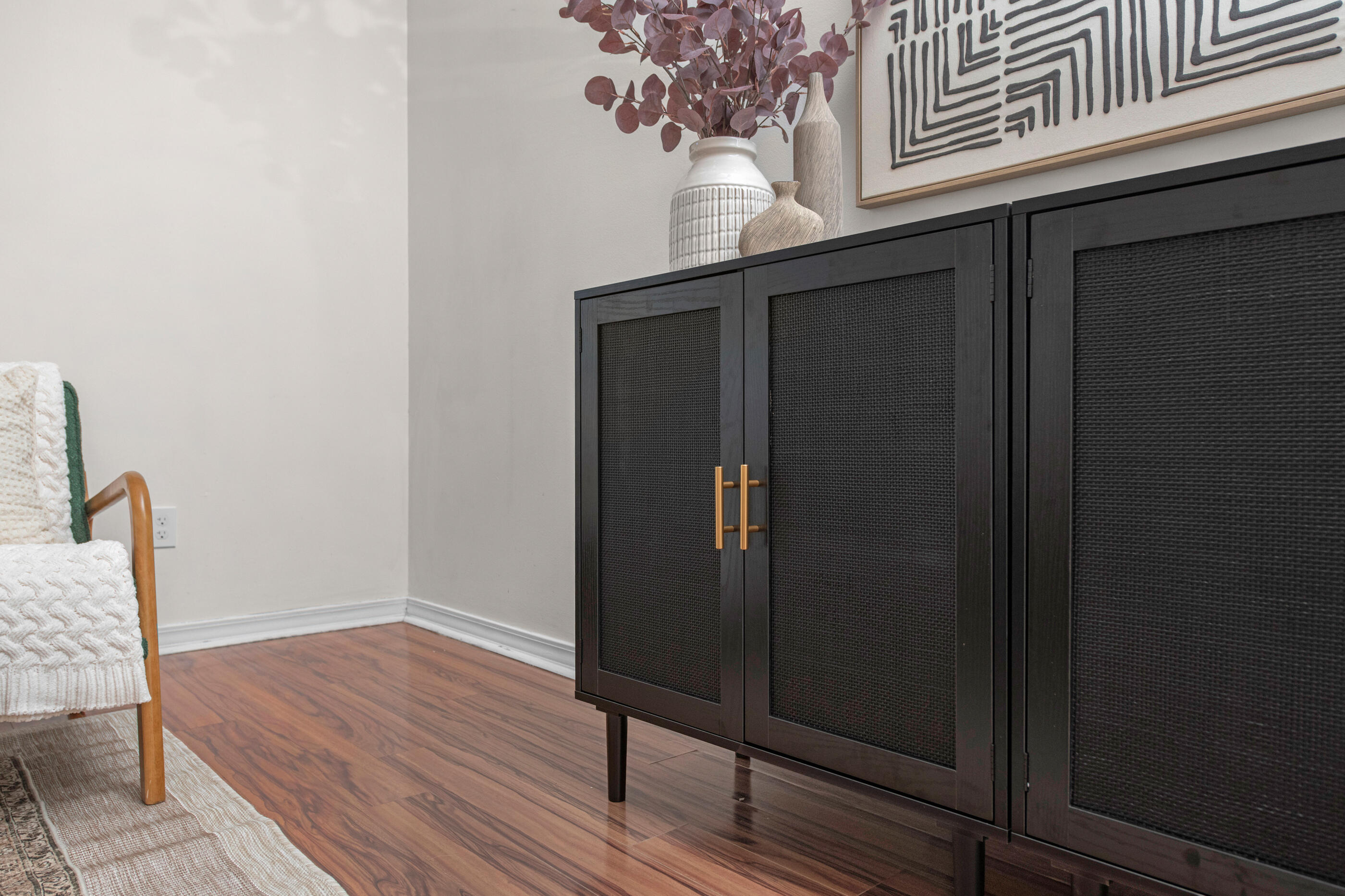 2709 Augustus Road Navarre, FL 32566 - Photo 24 of 46 a view of a hallway with wooden floor and staircase