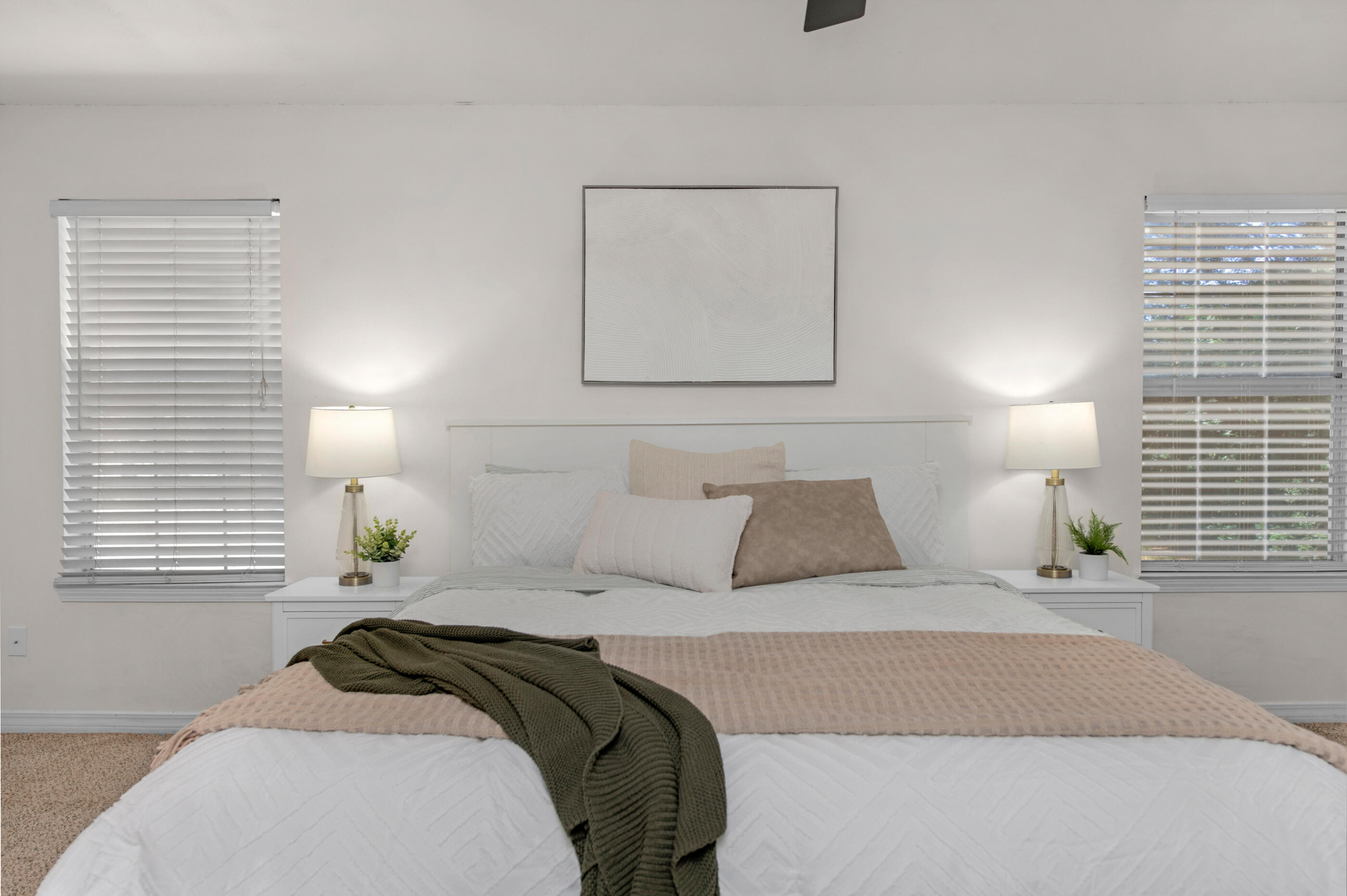 2709 Augustus Road Navarre, FL 32566 - Photo 28 of 46 a bedroom with a bed and a lamp