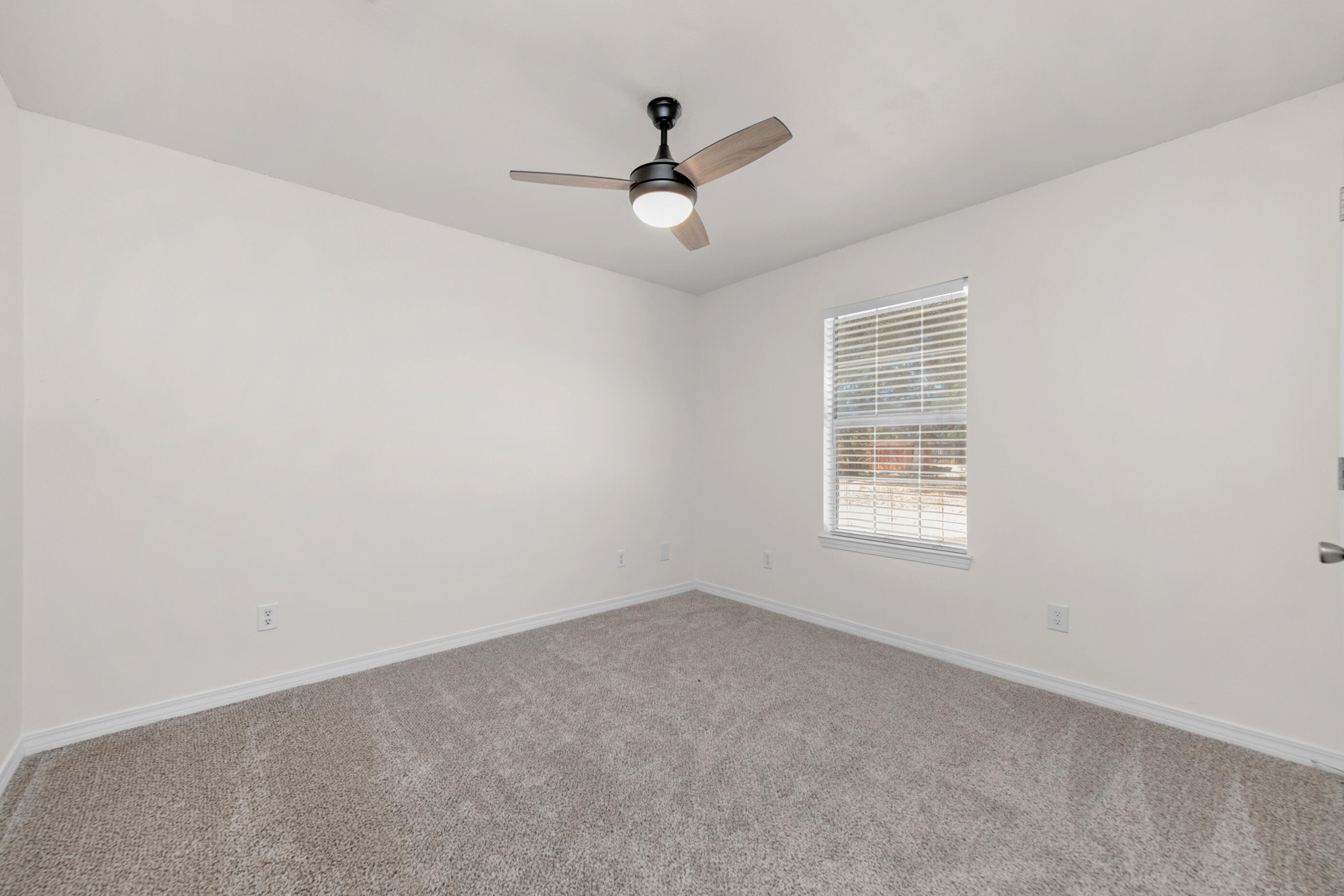 2709 Augustus Road Navarre, FL 32566 - Photo 35 of 46 an empty room with a window