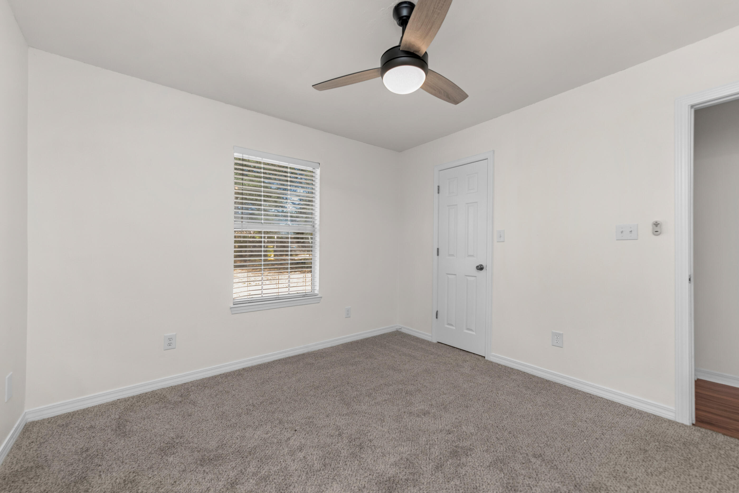 2709 Augustus Road Navarre, FL 32566 - Photo 36 of 46 a view of an empty room with a window