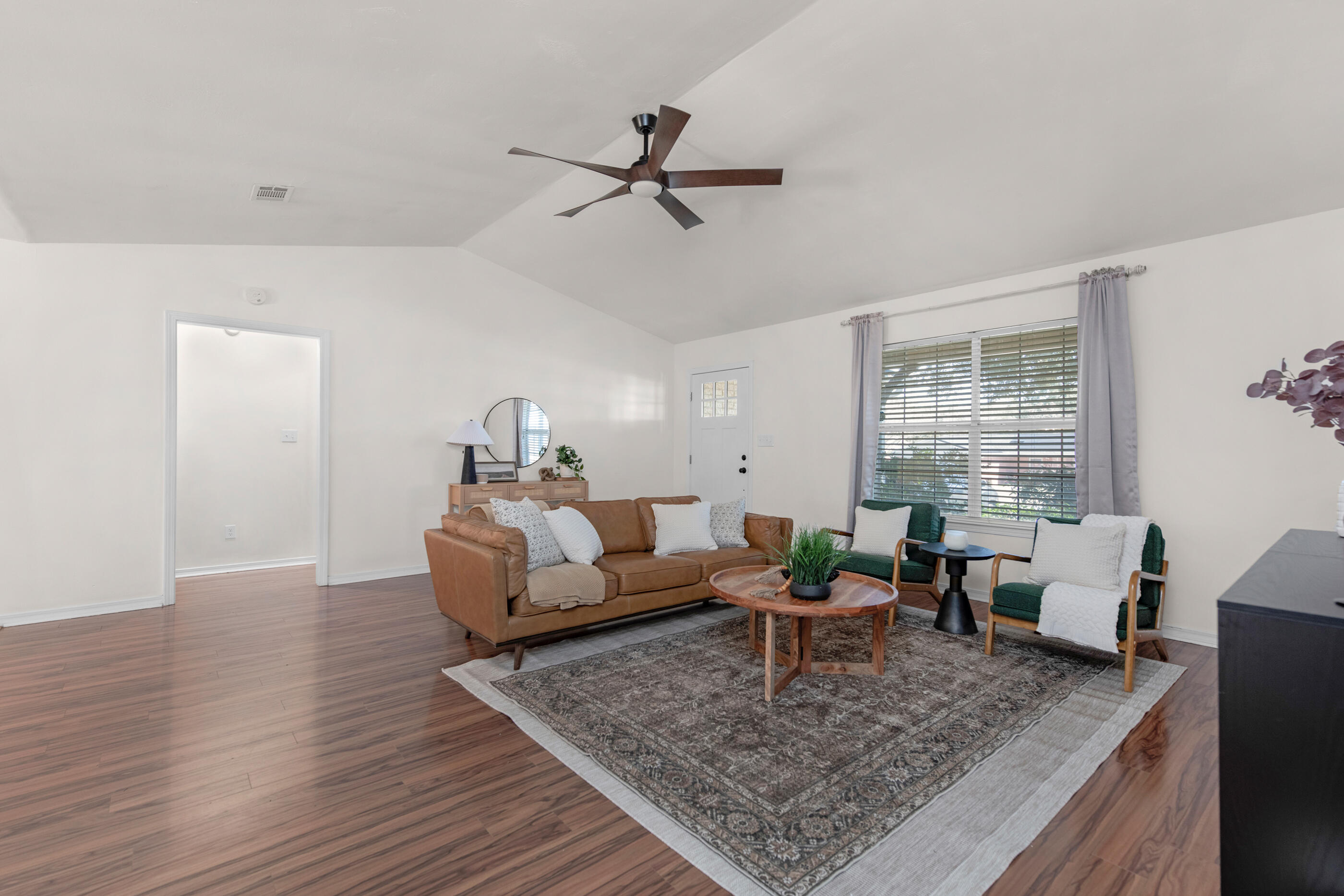 2709 Augustus Road Navarre, FL 32566 - Photo 8 of 46 a living room with furniture rug and window