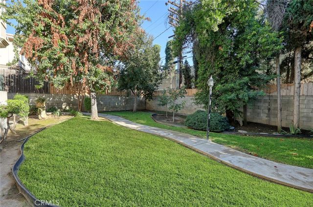 a view of a backyard with a garden