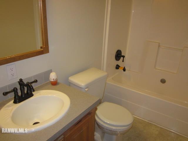 7264 East German Valley Road German Valley, IL 61039 - Photo 11 of 25 a bathroom with a sink and a toilet