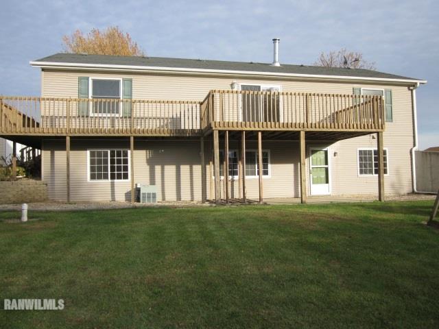 7264 East German Valley Road German Valley, IL 61039 - Photo 20 of 25 a front view of a house with a garden