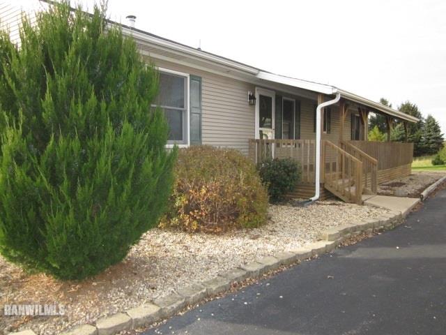 7264 East German Valley Road German Valley, IL 61039 - Photo 3 of 25 a view of a house with a yard