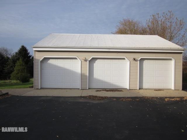 7264 East German Valley Road German Valley, IL 61039 - Photo 4 of 25 a front view of a house with yard