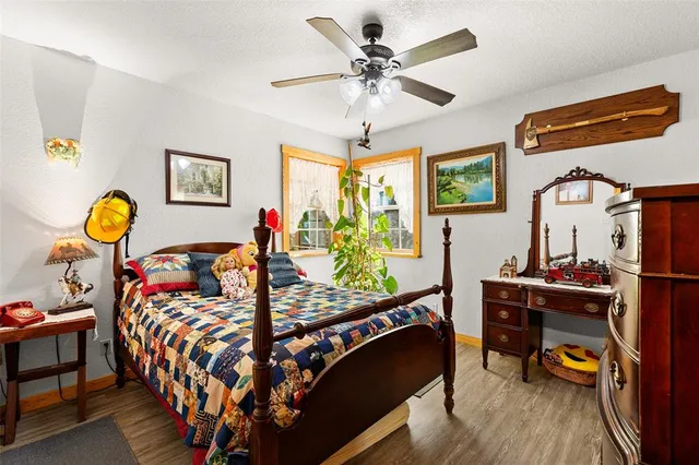 a bed room with furniture and a window