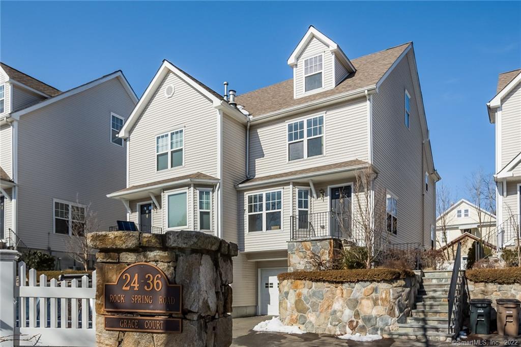 28 Rock Spring Road, Unit B2 Stamford, CT 06906 - Photo 1 of 1 a front view of a house with balcony
