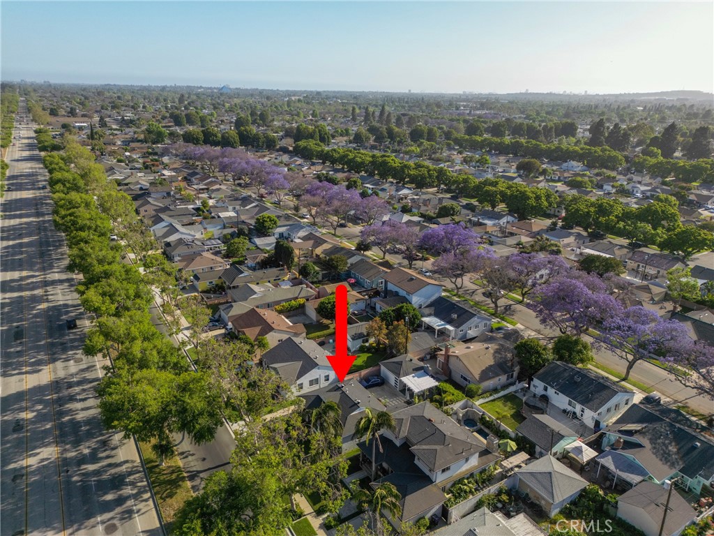 3743 North Studebaker Road Long Beach, CA 90808 - Photo 33 of 34 Nestled behind mature trees, it's a beautiful. street