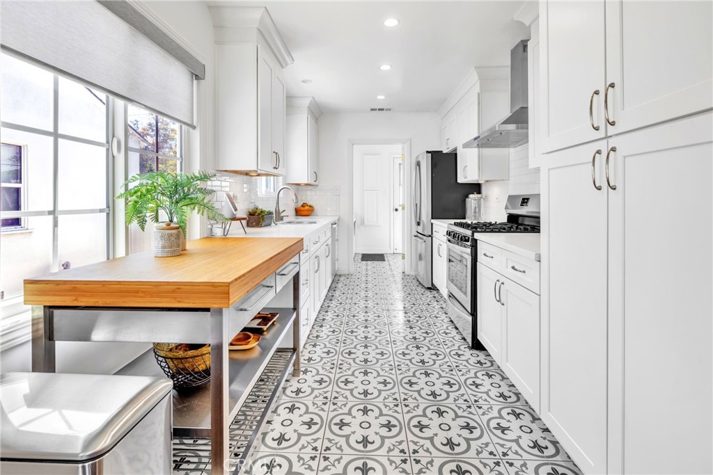 3743 North Studebaker Road Long Beach, CA 90808 - Photo 7 of 34 Tons of storage space in this kitchen.
